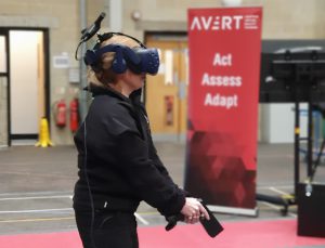 VR in action with AVRT banner in background