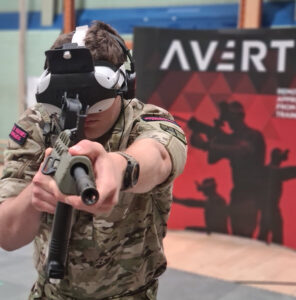 Military personal reacting to scenario within virtual reality programme