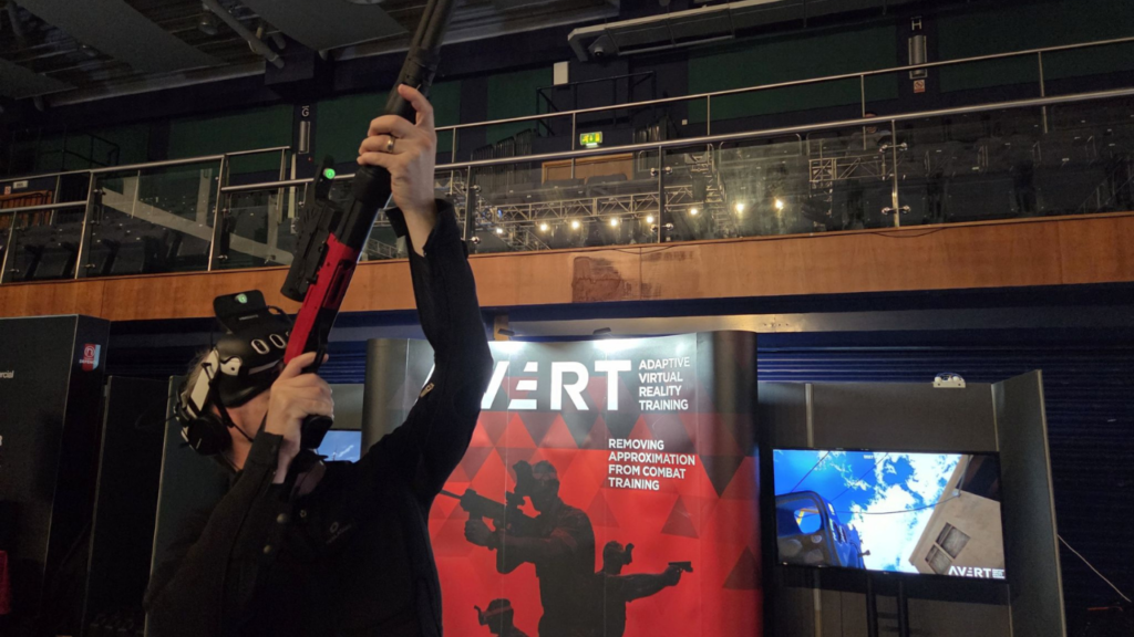 Military VR trainee engaging an aerial drone threat using AVRT Counter-UAS training system