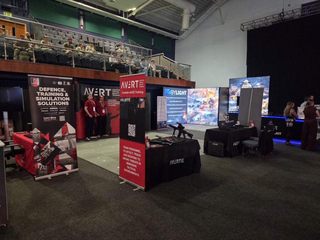 AVRT Counter-sUAS Training stand at DSET 2026 with drone threat detection VR banner
