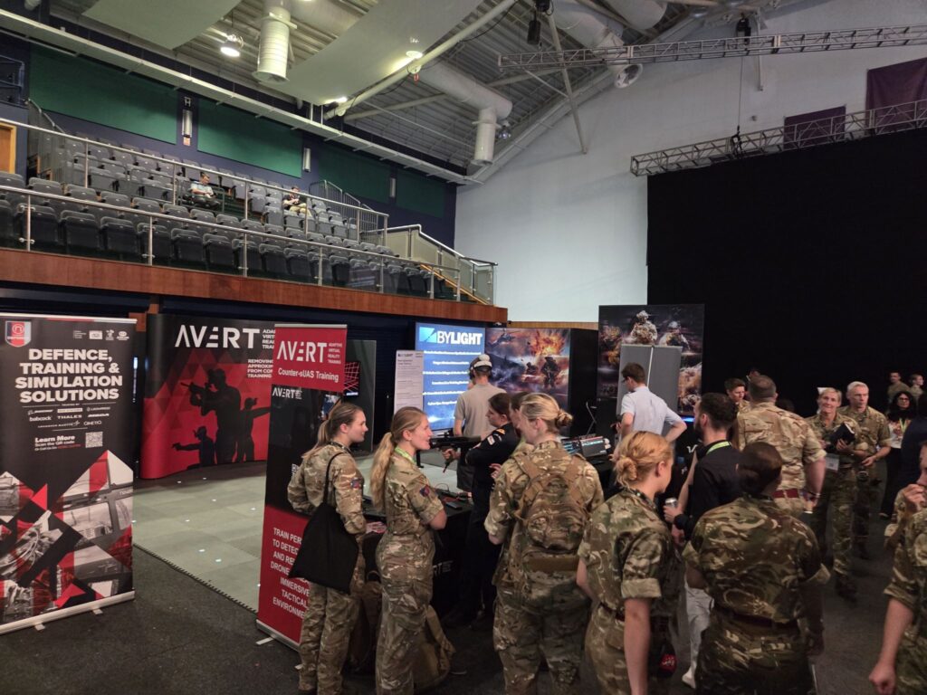 Groups of military personnel queue to try AVRT Counter-UAS VR training at DSET 2026